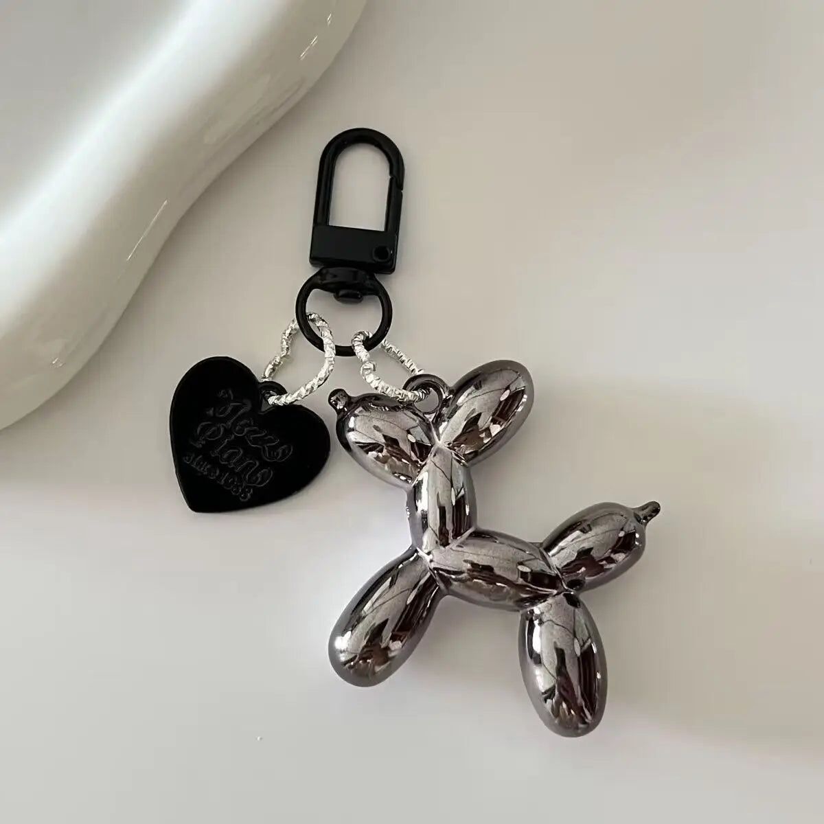Obsidian Chrome Charm